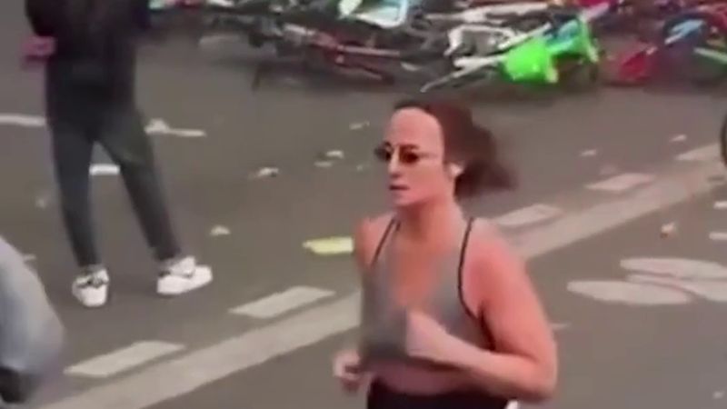 Paris'te kargaşanın ortasında koşuya çıkan kadın sosyal medyada gündem oldu
